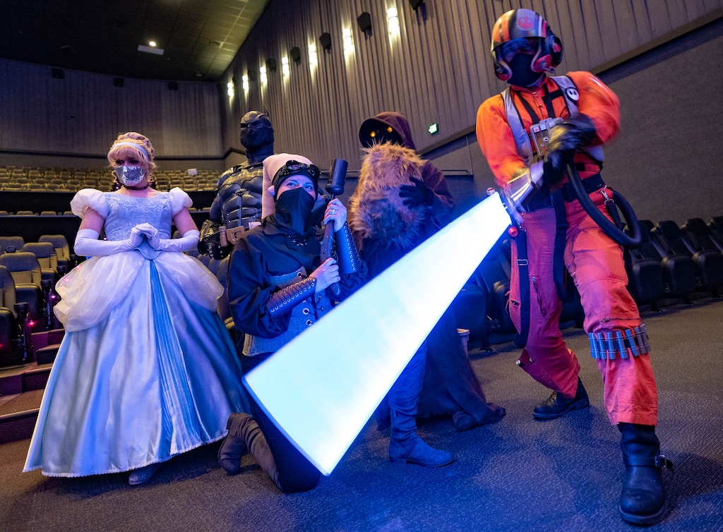(Francisco Kjolseth | The Salt Lake Tribune) Cosplay fans Bradi Webb, Travis Hysell, Coincidence Cosplay, Marial Clark and Eric Allan Hall, from left, pose for photographs following announcements by FanX of its plans for the September 2021 comic convention as they join the fun at Valley Fair Mall on Tuesday — International Star Wars Day ("May the Fourth Be With You"), 2021. The convention will be held at the Salt Palace Convention Center, Sept. 16-18, 2021.