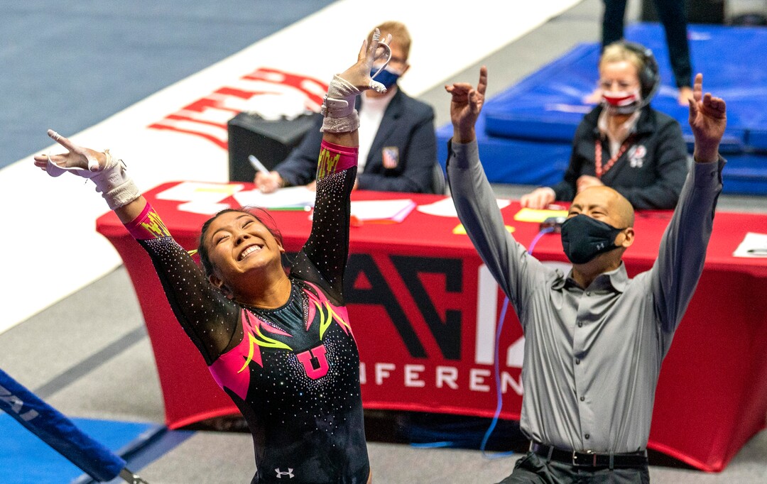 (Rick Egan | The Salt Lake Tribune) Cristal Isa and Utah head coach Tom Farden react after Isa lands her dismount from the uneven bars, in PAC-12 gymnastics action Utah vs Arizona, at the Huntsman Center onSaturday, Jan. 23, 2021.