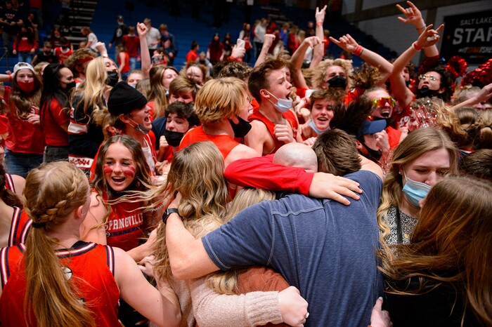 (Trent Nelson  |  The Salt Lake Tribune) Springville players and fans celebrate their win over Farmington High School in the 5A girls basketball state championship game, in Taylorsville on Saturday, March 6, 2021.