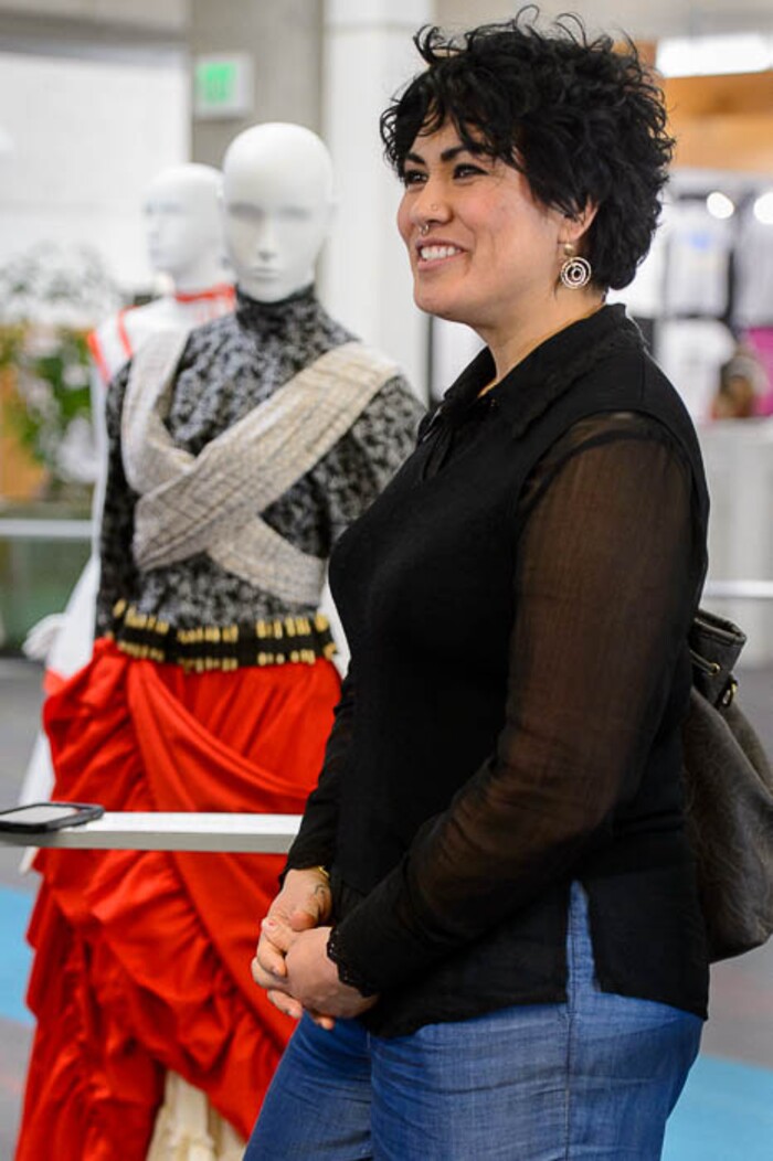 (Trent Nelson | The Salt Lake Tribune)  Claudia Montserrate Brunet talks about her dress, Dreamer's Revolution, which is part of "Dressed to Protest," a new exhibit presented by students in Salt Lake Community College's Fashion Institute, in Taylorsville, Thursday January 18, 2018. The exhibit shows how clothing can (and has) been used as a way for social and political protest. Most of the pieces are student designs, but a few come from the Fashion Institute's historic clothing collection.