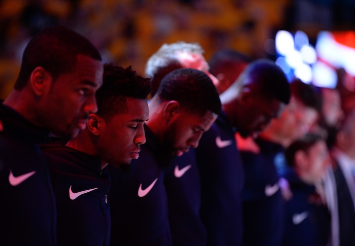 (Francisco Kjolseth | The Salt Lake Tribune) The Utah Jazz bow their heads during the playing of the national anthem before their game against the Houston Rockets in Game 4 of the NBA playoffs at the Vivint Smart Home Arena Sunday, May 6, 2018 in Salt Lake City.
