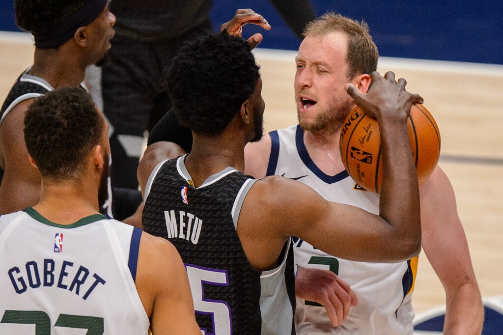 (Trent Nelson  |  The Salt Lake Tribune) Utah Jazz guard Joe Ingles (2) scores and is fouled by Sacramento Kings forward Chimezie Metu (25), as the Utah Jazz host the Sacramento Kings, NBA basketball in Salt Lake City on Saturday, April 10, 2021.