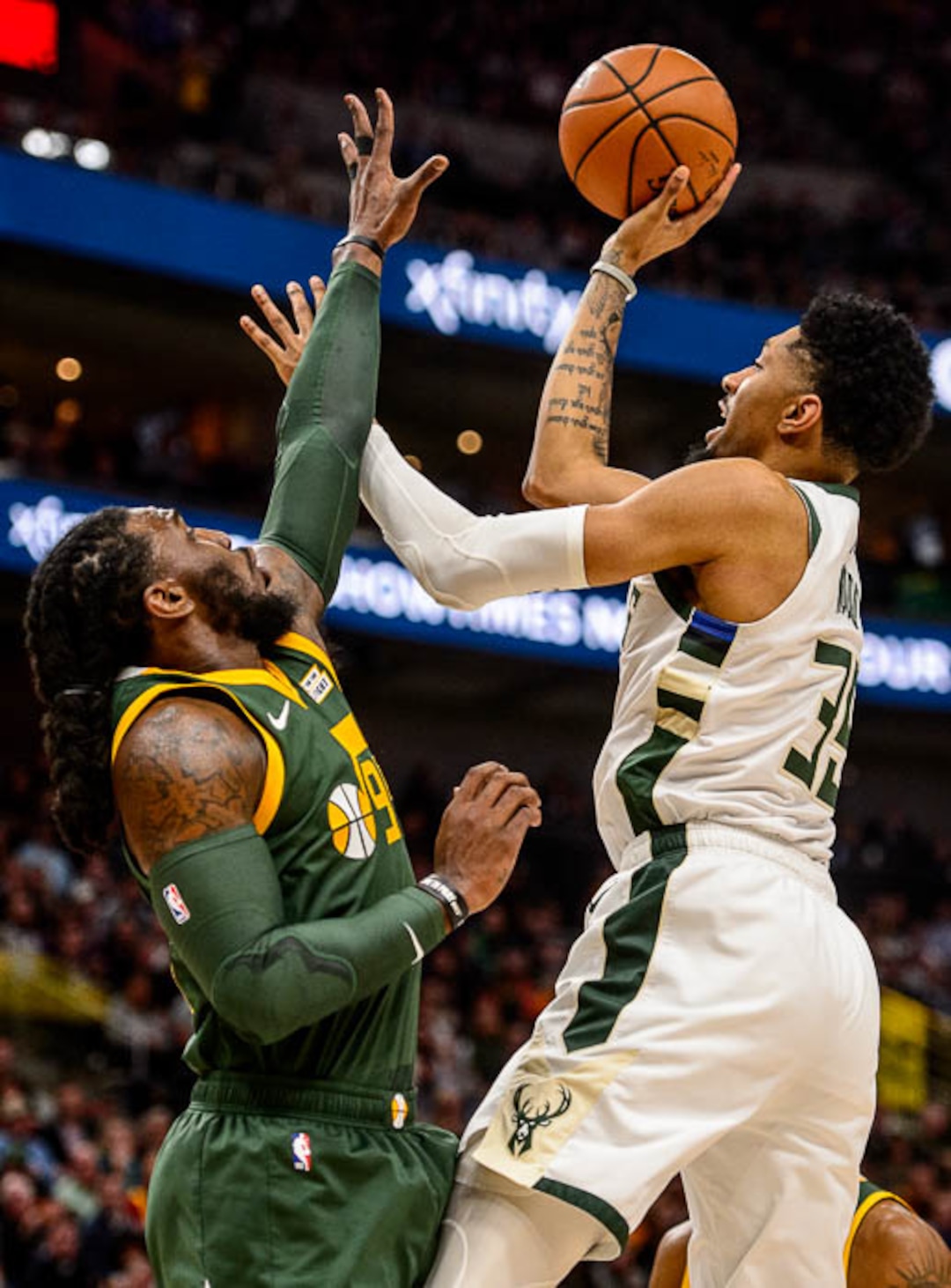 (Trent Nelson | The Salt Lake Tribune)  Utah Jazz forward Jae Crowder (99) defending Milwaukee Bucks forward Christian Wood (35) as the Utah Jazz host the Milwaukee Bucks, NBA basketball in Salt Lake City on Saturday March 2, 2019.