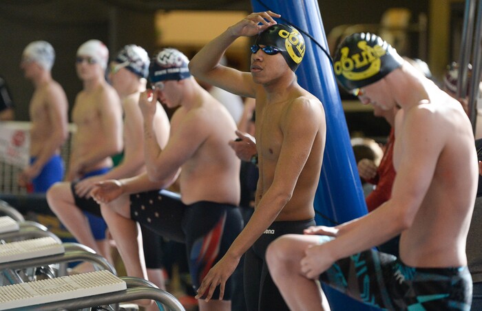 (Francisco Kjolseth | The Salt Lake Tribune) Blayze Kimble of Cottonwood prepares for his win in the Men 200 Yard IM at the high school swimming 5A State Championships in Bountiful, Friday February 9, 2018.