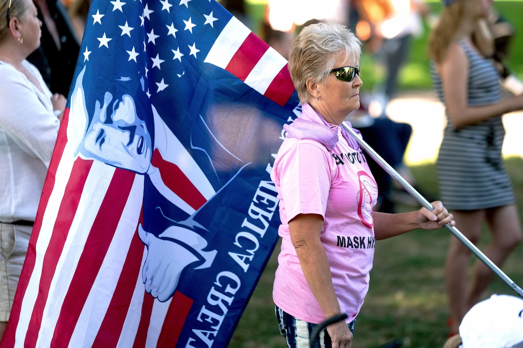 Sherri Coonce attends a memorial for Aaron J. Danielson on Saturday, Sept. 5, 2020, in Vancouver, Wash. Danielson, a supporter of the conservative group Patriot Prayer, was fatally shot in August as supporters of President Donald Trump and Black Lives Matter protesters clashed in Portland, Ore. (AP Photo/Noah Berger)