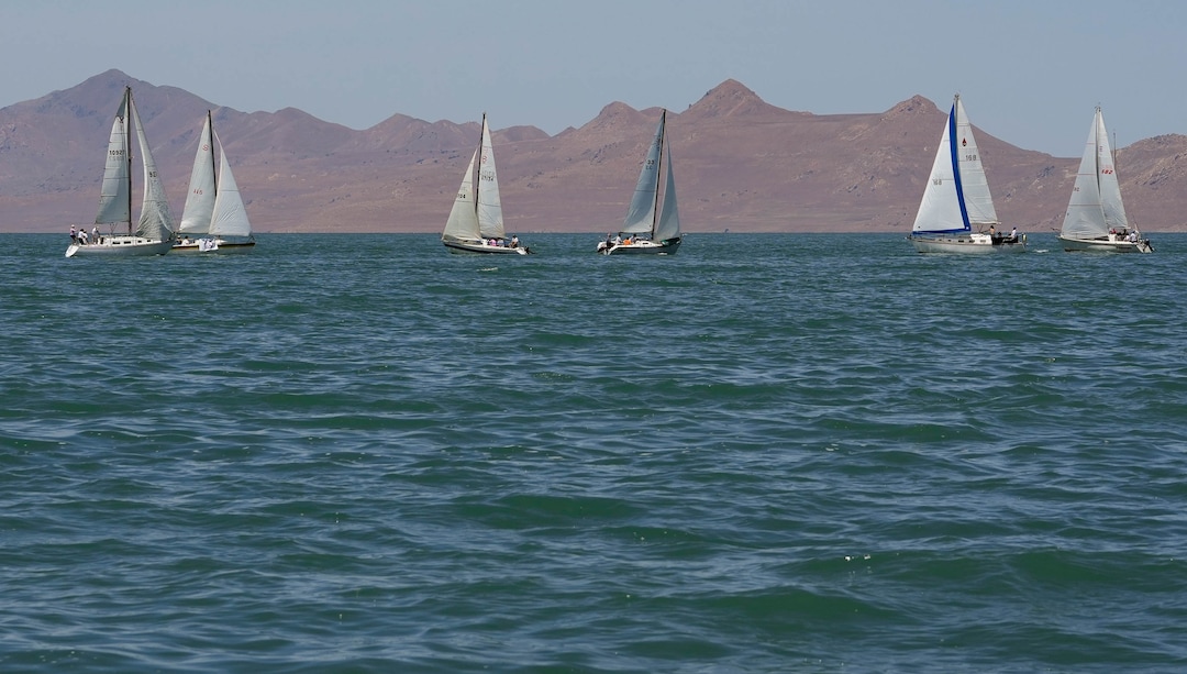 (Francisco Kjolseth  |  The Salt Lake Tribune) Sailfest regatta returns to the Great Salt Lake following a five-year hiatus due to low lake levels and the pandemic on Saturday, June 15, 2024. Hosted by the Great Salt Lake Yatch Club and Grow the Flow, the event seeks to get people out to the lake and raise awareness of and engagement with efforts to save it. 