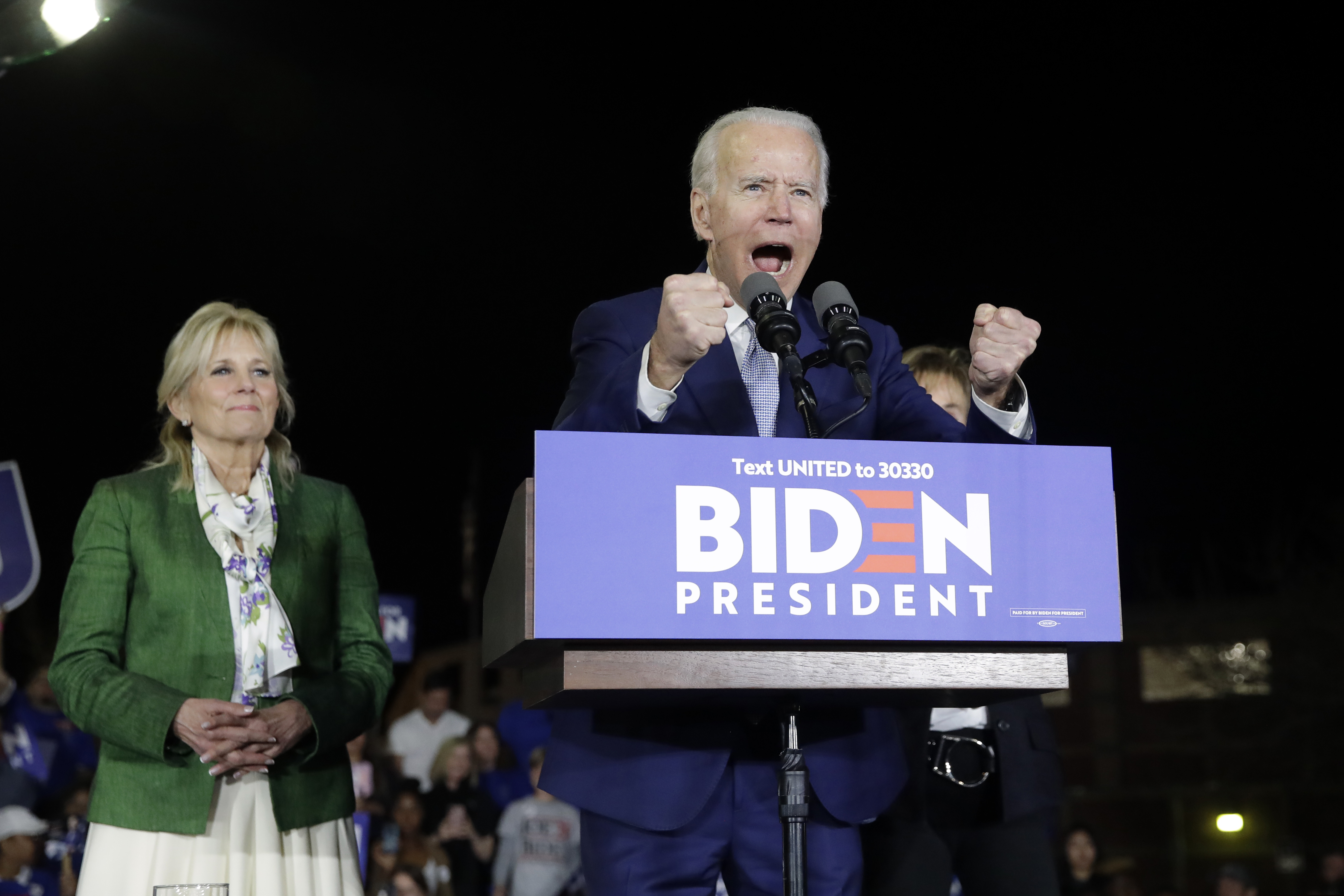 (Marcio Jose Sanchez | AP) Democratic presidential candidate former Vice President Joe Biden, right, speaks next to his wife Jill during a primary election night rally Tuesday, March 3, 2020, in Los Angeles.