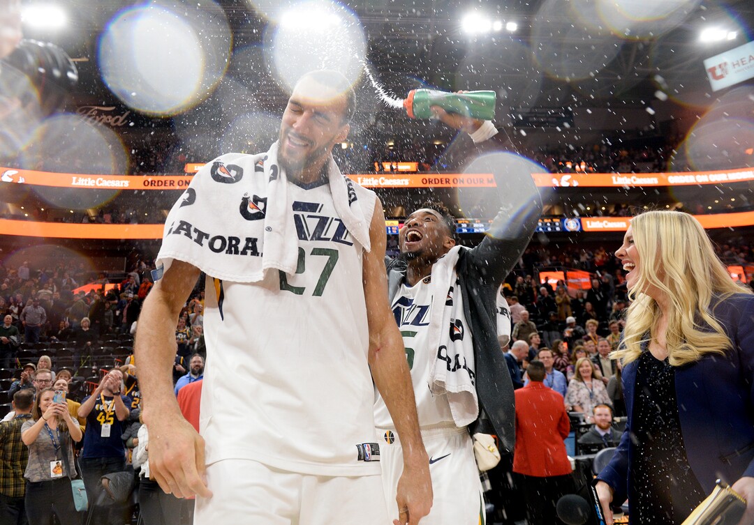 Leah Hogsten  |  The Salt Lake Tribune  Utah Jazz guard Donovan Mitchell (45) drenches Utah Jazz center Rudy Gobert (27) after the game. The Utah Jazz defeated the Atlanta Hawks, 128-112  at Vivint Smart Home Arena, Feb. 1, 2019. 