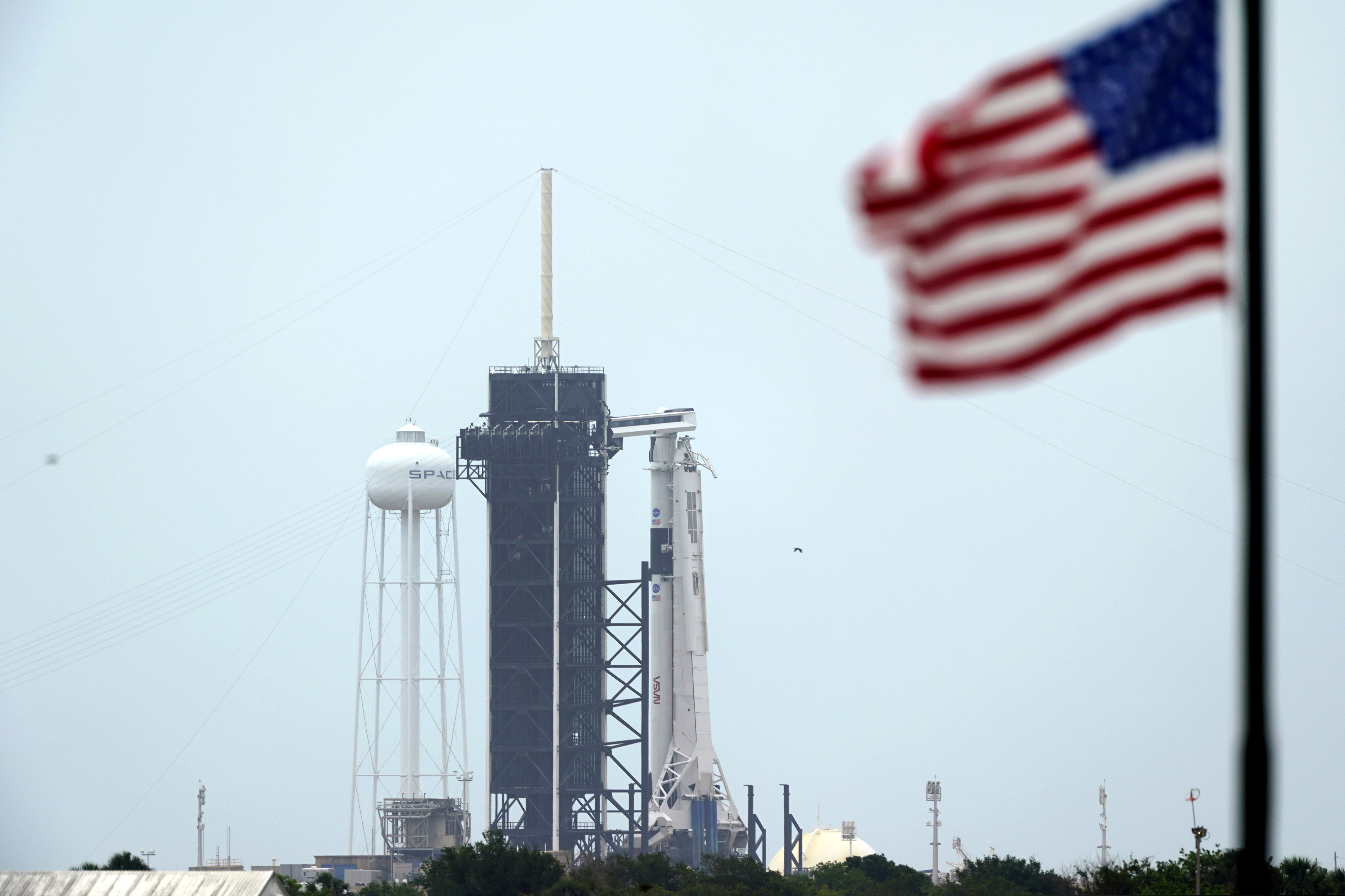 (David J. Phillip | The Associated Press) The SpaceX Falcon 9, with the Crew Dragon spacecraft on top of the rocket, sits on Launch Pad 39-A Monday, May 25, 2020, at Kennedy Space Center, Fla. Two astronauts will fly on the SpaceX Demo-2 mission to the International Space Station scheduled for launch on May 27.