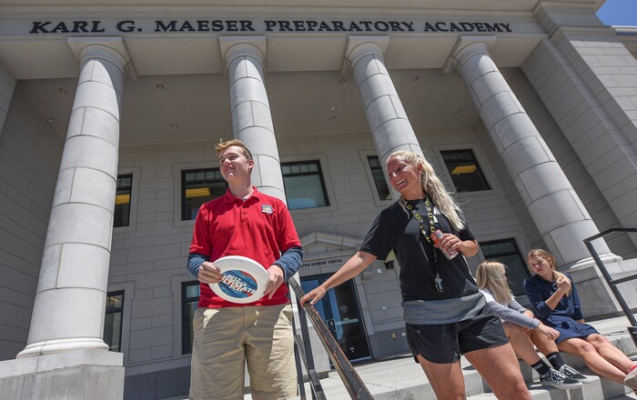 (Francisco Kjolseth  |  The Salt Lake Tribune)  Mitch Gregory, 16, joins PE health coach Shaylee Nielsen outside for a game of ultimate frisbee with the rest of the class at the Karl G. Maeser Preparatory Academy in Lindon on Tuesday, May 8, 2018. The academy was named Utah's best high school by U.S. News and World Report.