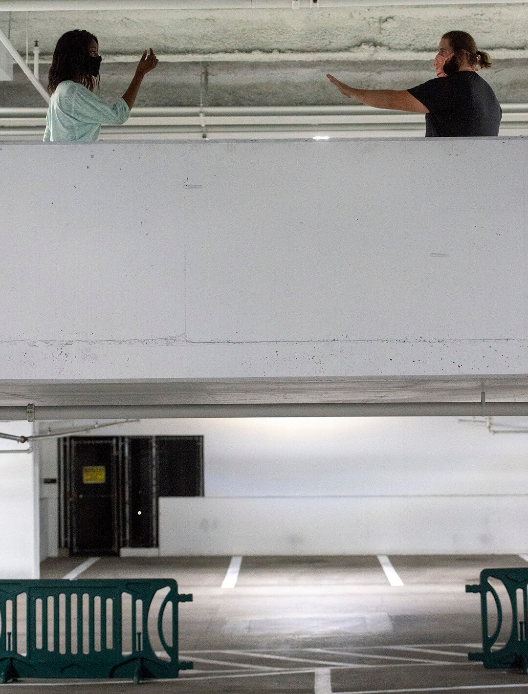 (Rick Egan  |  The Salt Lake Tribune) Nadia Sine and Jacob Baird, who play Juliet and Romeo, rehearse with Salt Lake City theater troupe SONDERimmersive for "Through Yonder Window," a theater-and-movement adaptation of "Romeo and Juliet." The performers stay at least 6 feet apart and audience members will stay in their cars.