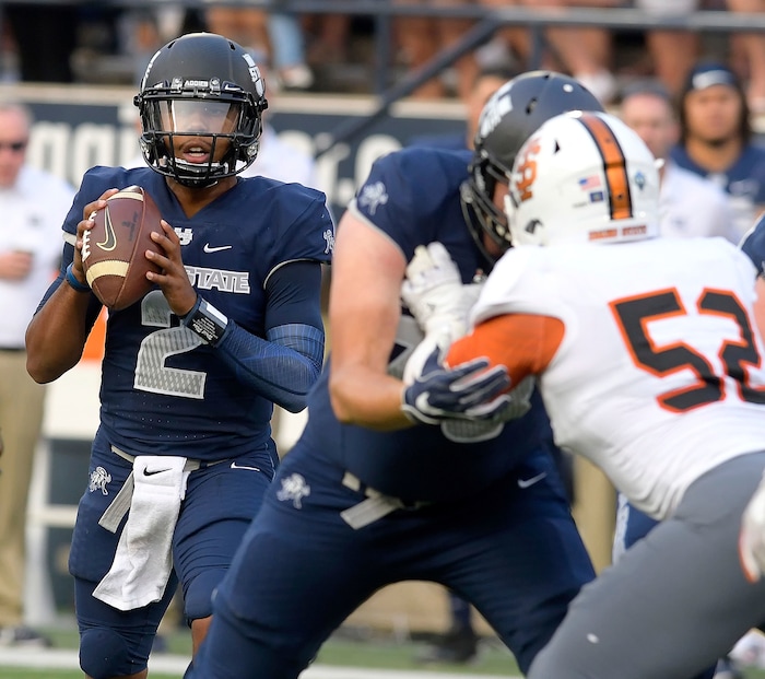 Utah State quarterback Kent Myers (2) looks to throw the ball against Idaho State during an NCAA college football game Thursday, Sept. 7, 2017, in Logan, Utah. (Eli Lucero/Herald Journal via AP)