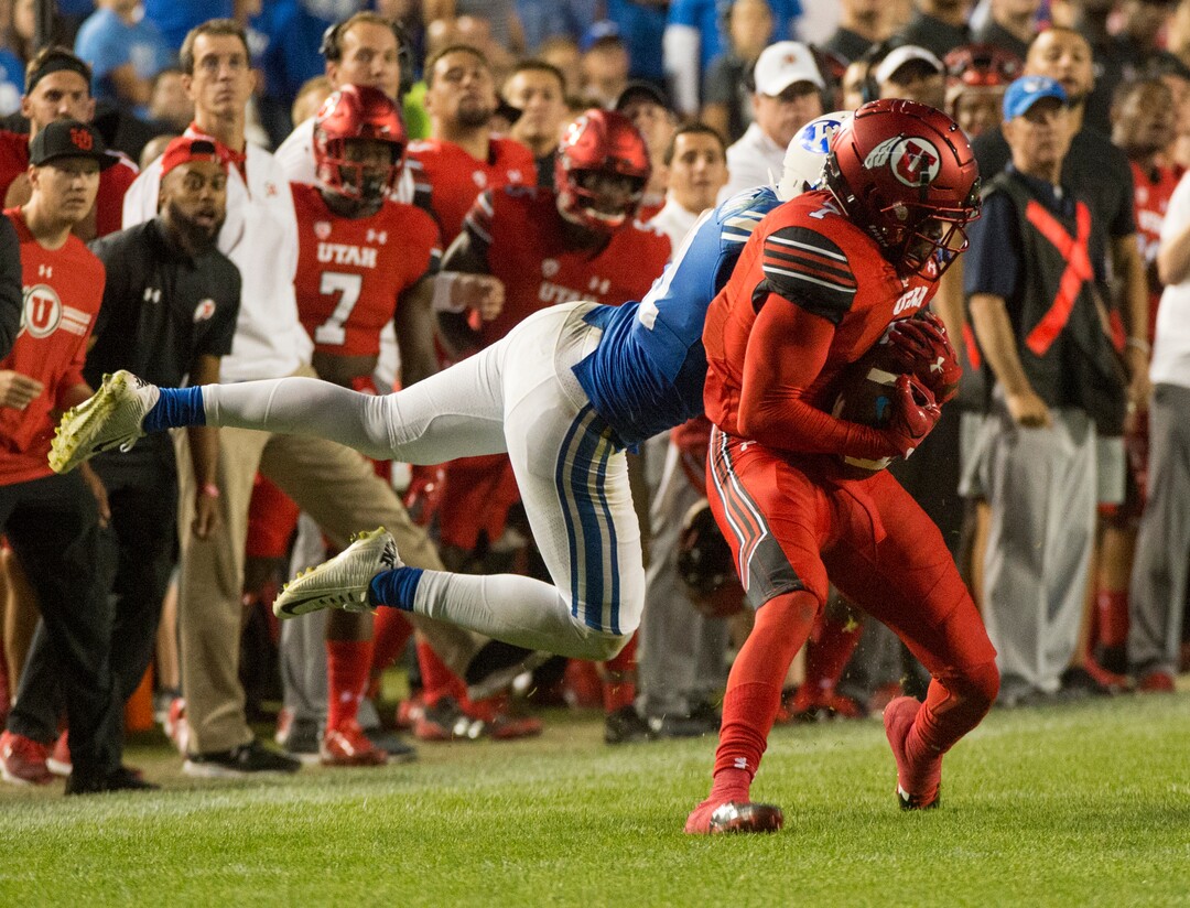 (Rick Egan  |  The Salt Lake Tribune)  Utah Utes defensive back Jaylon Johnson (7) intercepts a pass intended for Brigham Young Cougars wide receiver Talon Shumway (21), in football action BYU vs Utah, at Lavell Edwards Stadium in Provo, Saturday, September 9, 2017.
