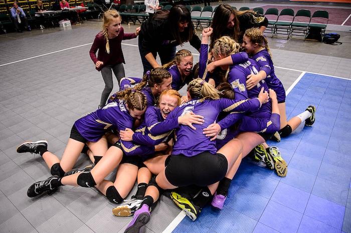(Trent Nelson | The Salt Lake Tribune) North Summit players celebrate after defeating Enterprise in the 2A State Volleyball Championship game in Orem, Saturday October 28, 2017.