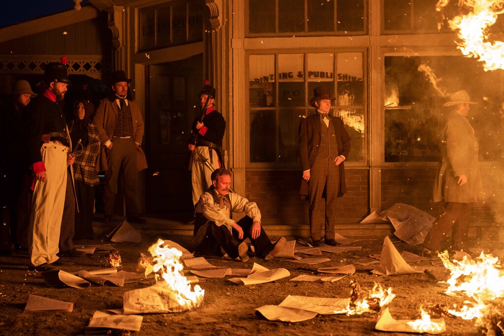 (Michelle Faye | FX) A flashback in "Under the Banner of Heaven" shows the destruction of the Nauvoo Expositor.
