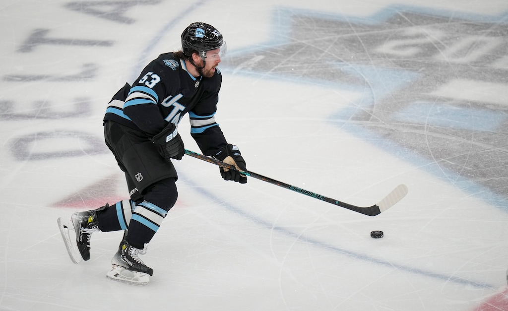 (Bethany Baker  |  The Salt Lake Tribune) Michael Carcone (53) brings the puck down the ice during the third period of the game at the Delta Center in Salt Lake City on Monday, Dec. 2, 2024.