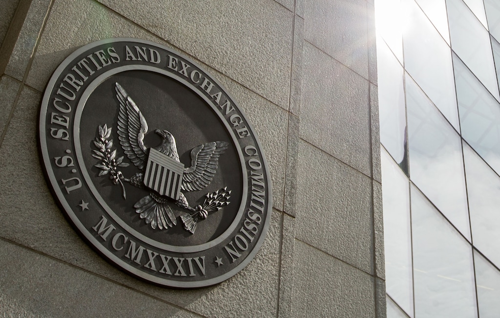 FILE - This June 19, 2015 file photo shows the seal of the U.S. Securities and Exchange Commission at SEC headquarters, in Washington.  (AP Photo/Andrew Harnik, File)