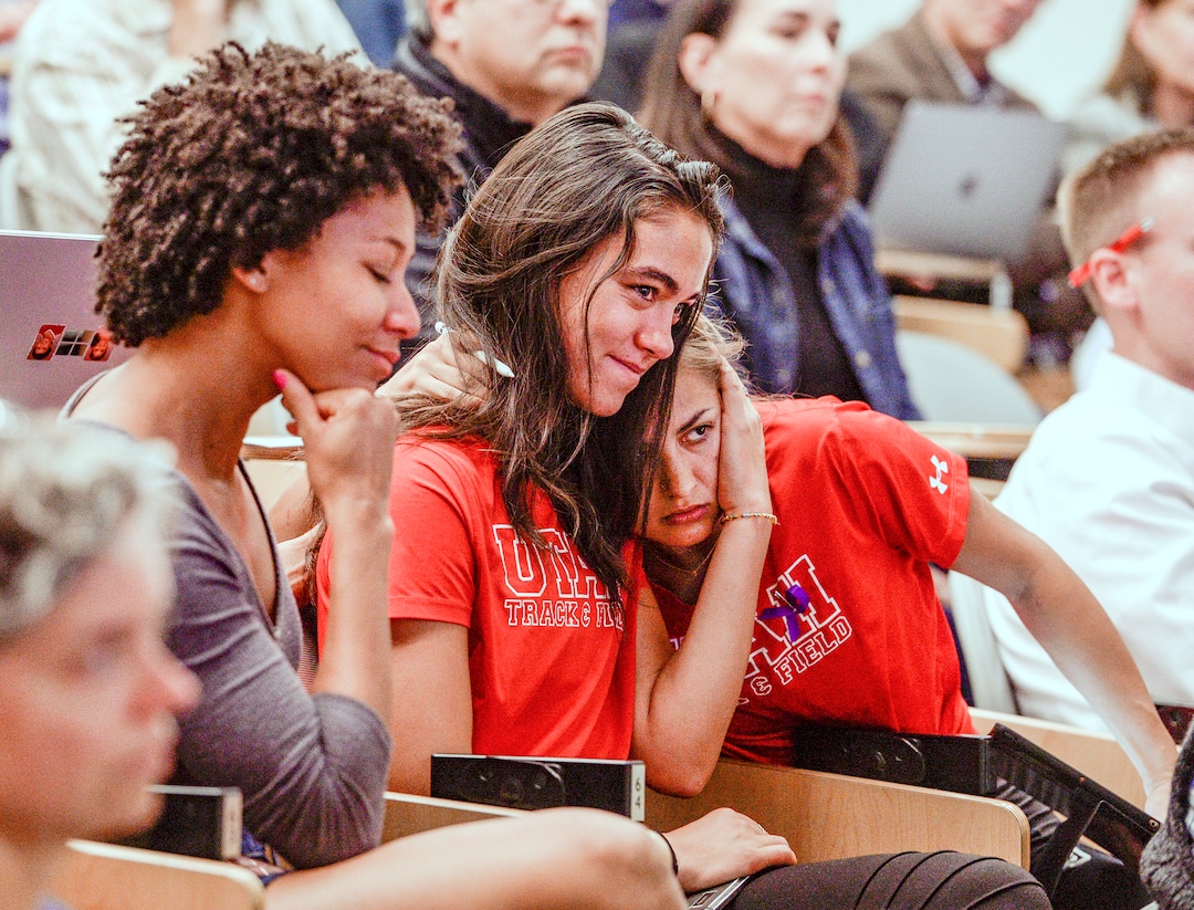 (Leah Hogsten  |  The Salt Lake Tribune) l-r University of Utah track and field alumni Alissa Atisme, freshman Ally Gomm and senior Brooke Martin console each other during the academic senate meeting Sept. 30, 2019 at the Henry Erying Building on campus. "Change needs to happen," said Martin of campus safety. "I need Lauren to be heard. She can't speak anymore." Lauren McCluskey, Martin's friend and track and field colleague at the University of Utah, was shot and killed in October 2018 on campus by an ex-boyfriend.