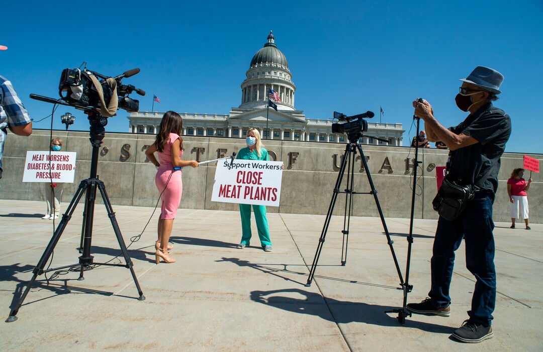 (Rick Egan  |  The Salt Lake Tribune) News Media interviews Niki Davis, as she joins a protest at the State Capitol as the Physicians Committee for Responsible Medicine is asking Gov. Herbert to close meatpacking plants in the state to slow the spread of the coronavirus, Thursday, July 30, 2020.