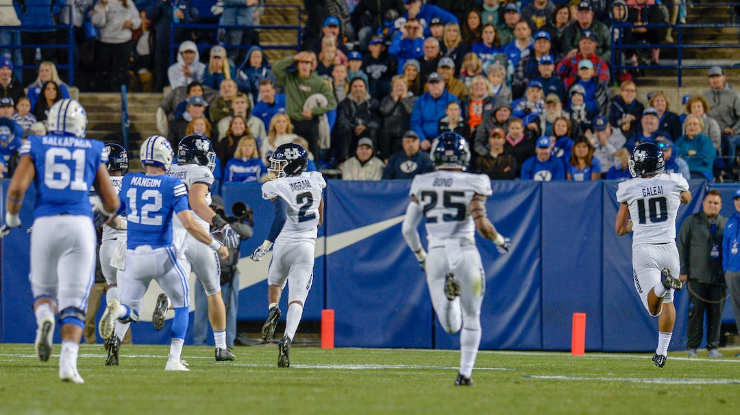 Leah Hogsten  |  The Salt Lake Tribune  Utah State Aggies linebacker Tipa Galeai (10) makes a 56yard run for a touchdown in the first half as BYU hosts Utah State University at Lavell Edwards Stadium in Provo, Friday, Oct. 5, 2018.