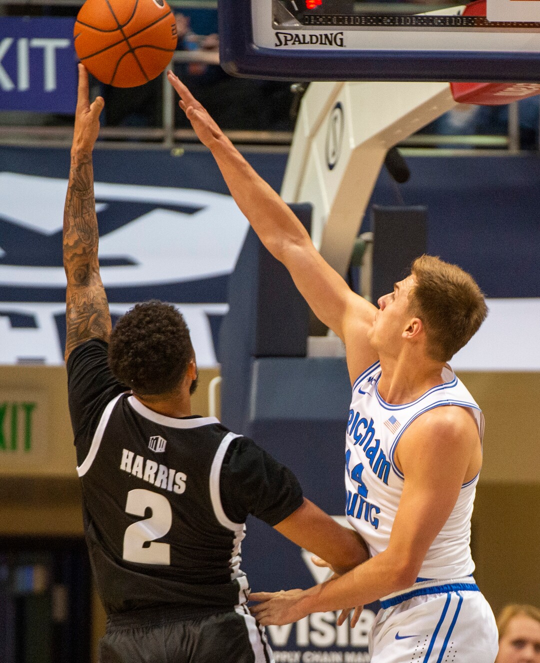 (Rick Egan  |  The Salt Lake Tribune)        Brigham Young Cougars guard Connor Harding (44), blocks a shot by Nevada Wolf Pack guard Jalen Harris (2), in basketball action between the Brigham Young Cougars and the Nevada Wolf Pack, at the Marriott Center, in Provo, Saturday, December 10, 2019.