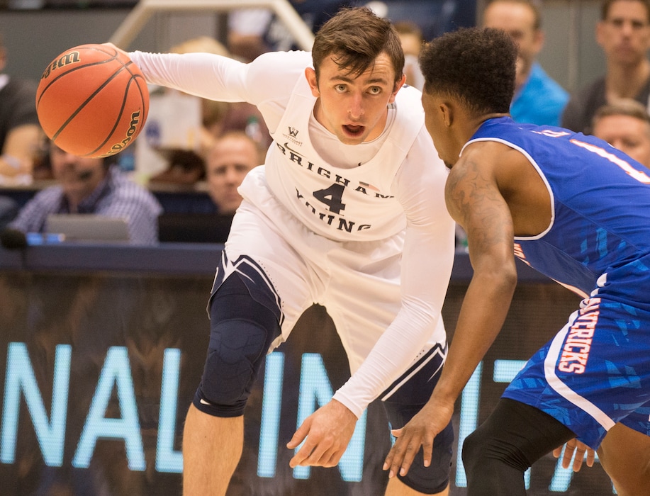 Rick Egan | The Salt Lake Tribune
Brigham Young Cougars guard Nick Emery (4) is guarded by Texas-Arlington Mavericks guard Erick Neal (1), in NIT basketball action Brigham Young Cougars vs. Texas-Arlington Mavericks, at the Marriott Center, Wednesday, March 15, 2017.