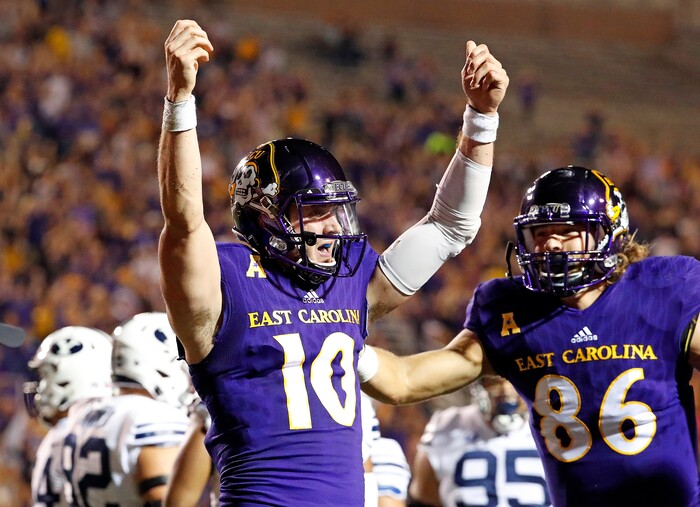 East Carolina's Thomas Sirk (10) celebrates a touchdown during the first half of an NCAA college football game against BYU in Greenville, N.C., Saturday, Oct. 21, 2017. (AP Photo/Karl B DeBlaker)
