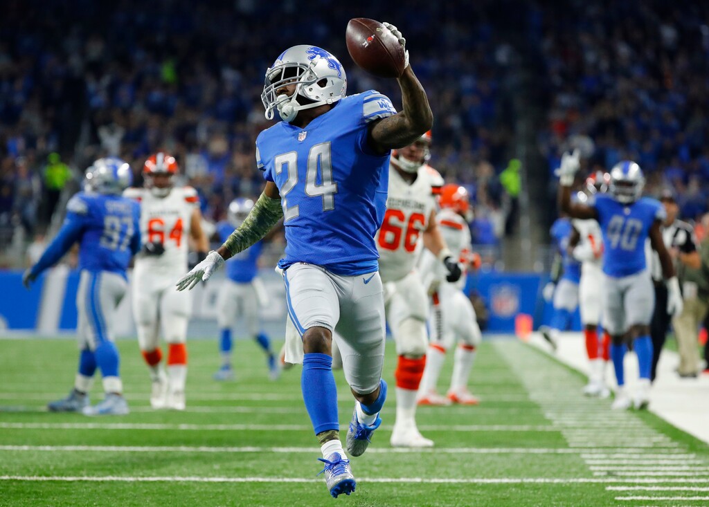 Detroit Lions cornerback Nevin Lawson (24) recovers a Cleveland Browns fumble and runs for a 44-yard touchdown during the first half of an NFL football game, Sunday, Nov. 12, 2017, in Detroit. (AP Photo/Rick Osentoski)