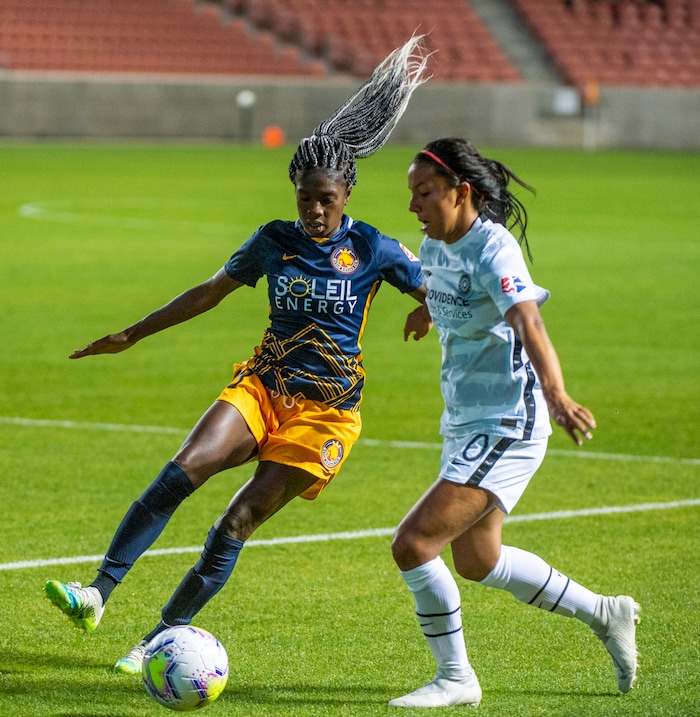 (Rick Egan | The Salt Lake Tribune) Utah Royals FC midfielder Aminata Diallo (38) and Portland Thorns FC forward Marissa Everett (40) go for the ball in soccer action between Utah Royals FC and Portland Thorns FC at Rio Tinto Stadium, on Saturday, Oct. 3, 2020.