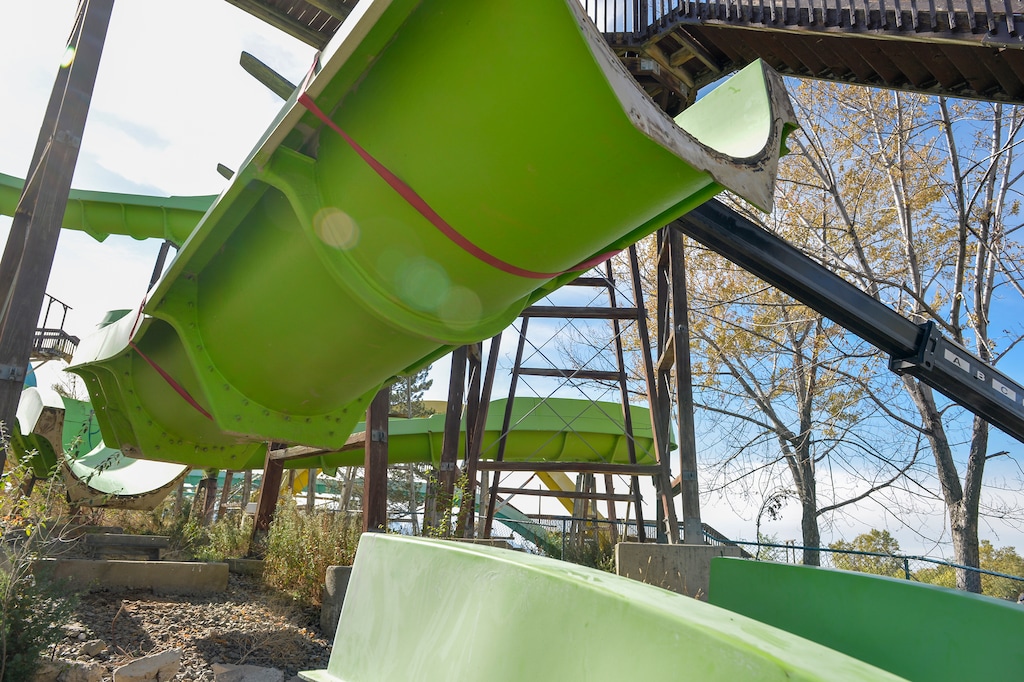 (Chris Samuels | The Salt Lake Tribune) Contractors begin the work of disassembling Raging Waters water park in Salt Lake City, Wednesday, Oct. 20, 2021. The park has been closed since 2018, and the city plans to renovate the area into a public asset.