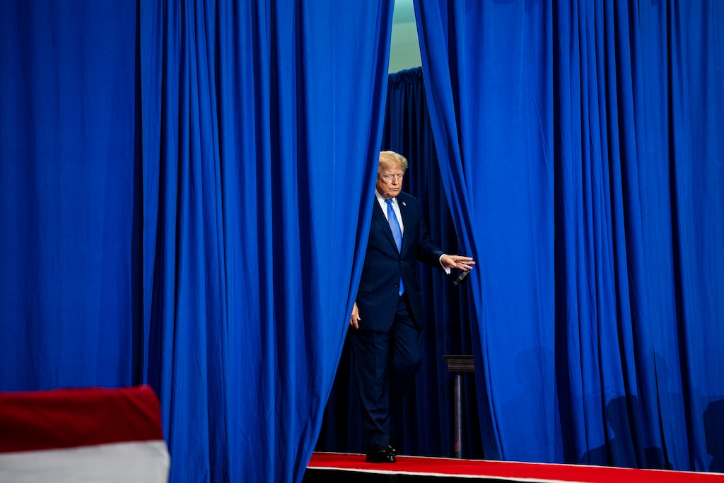 President Donald Trump takes the stage to speak in Garden City, N.Y., on Friday, Aug. 14, 2026. (Al Drago/The New York Times)