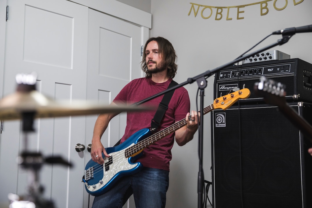 (Clark Clifford  |  For The Salt Lake Tribune) Chris Bennett of Noble Bodies playing bass during a practice for an upcoming show in the band's rehearsal space in Orem on Saturday, Aug. 3, 2019.