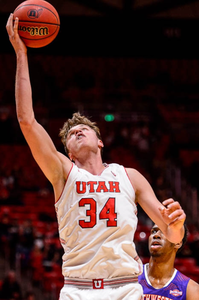 (Trent Nelson | The Salt Lake Tribune)  Utah Utes forward Jayce Johnson (34) pulls down a rebound as the University of Utah hosts Northwestern State, NCAA basketball in Salt Lake City, Wednesday December 20, 2017.