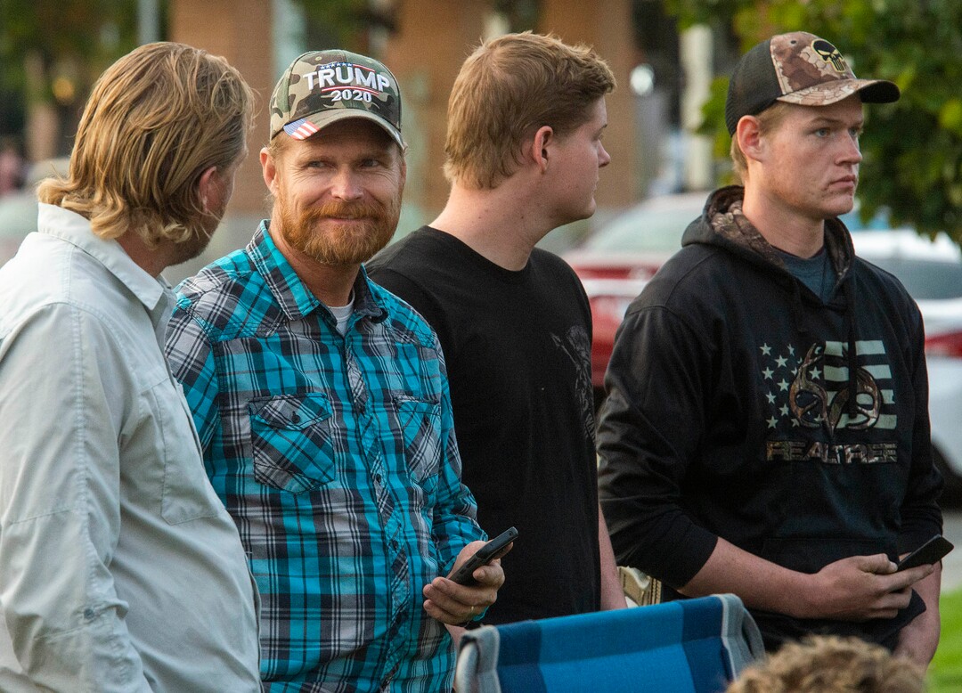 (Rick Egan  |  The Salt Lake Tribune)     Several people carried guns, but no one was wearing masks, as a couple of hundred people gather at the Provo Courthouse for the Utah County Freedom Rally on Friday, Oct. 2, 2020.
