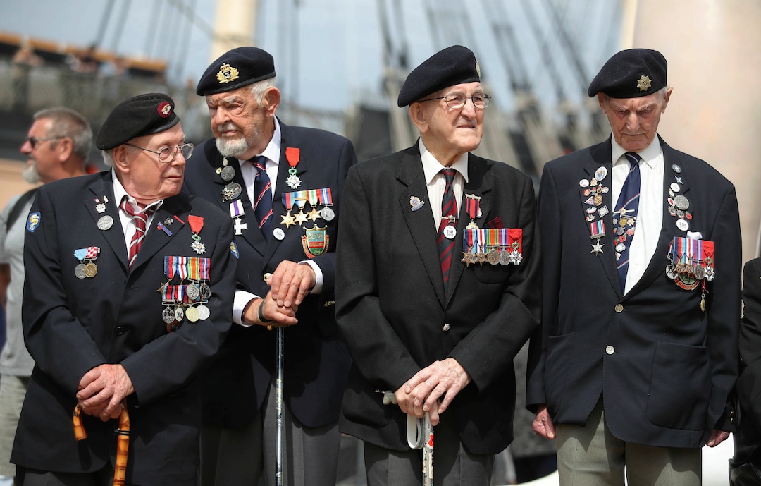 (Andrew Matthews | PA via AP) D-Day veterans gather during a D-Day commemoration event at the Historical Dockyard in Portsmouth, southern England, Sunday June 2, 2019. There are many events over the coming days to mark the 75th anniversary of the landings by the Allied forces on Tuesday June 6, 1944, in Normandy, France, that became known as D-Day.