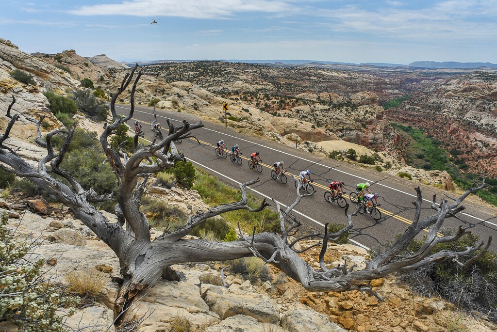 FILE - In this Aug. 2, 2016, file photo, cyclists race along the scenic Byway 12 above Calf Creek and the Grand Staircase-Escalante National Monument. (Francisco Kjolseth/The Salt Lake Tribune via AP, File)