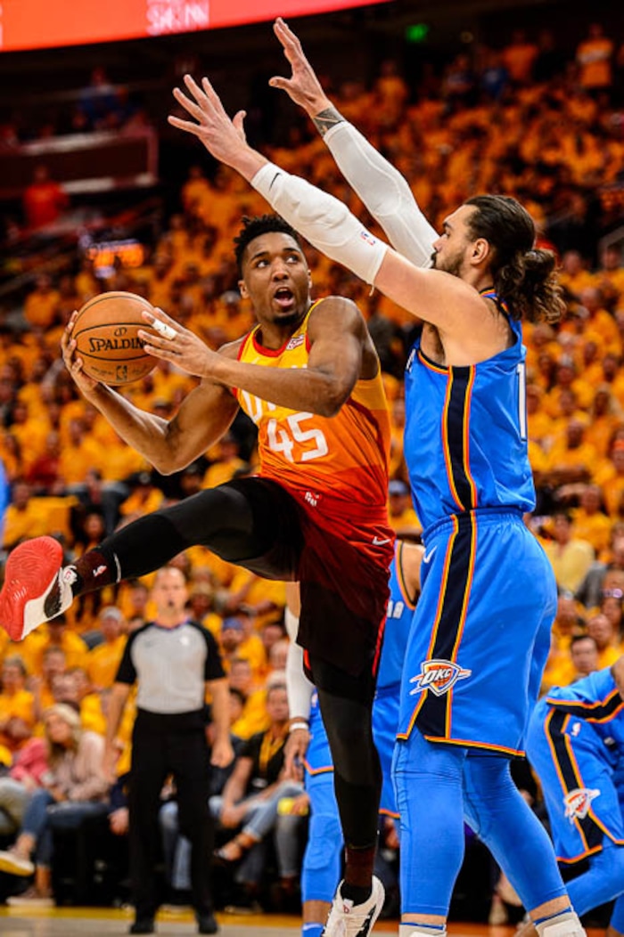 (Trent Nelson | The Salt Lake Tribune)  
Utah Jazz host the Oklahoma City Thunder, Game 3, NBA playoff basketball in Salt Lake City, Saturday April 21, 2018. Utah Jazz guard Donovan Mitchell (45) defended by Oklahoma City Thunder center Steven Adams (12).