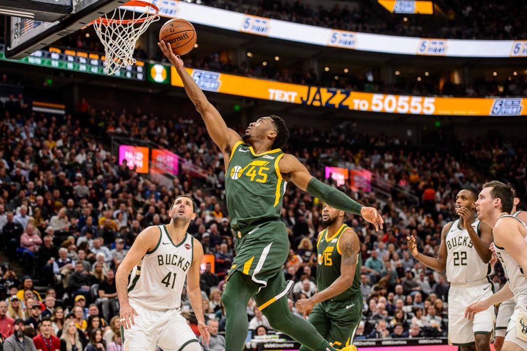 (Trent Nelson | The Salt Lake Tribune)  Utah Jazz guard Donovan Mitchell (45) scores in the fourth quarter as the Utah Jazz host the Milwaukee Bucks, NBA basketball in Salt Lake City on Saturday March 2, 2019.