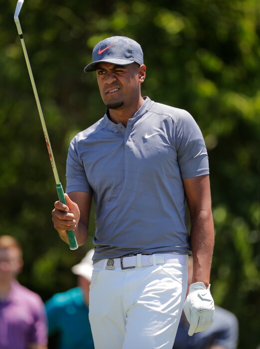 Tony Finau prepares for a tee shot off the 11th hole during the third round of the U.S. Open Golf Championship, Saturday, June 16, 2018, in Southampton, N.Y. (AP Photo/Frank Franklin II)