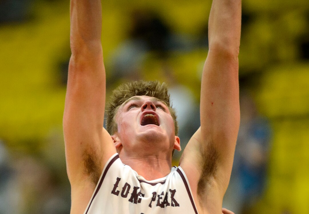 (Steve Griffin  |  The Salt Lake Tribune) Lone Peak's Max Brenchley stretches for a rebound during 6A basketball playoff game against Herriman at the Utah Valley UniversityÕs UCCU Center in Provo Tuesday Feb. 27, 2018.
