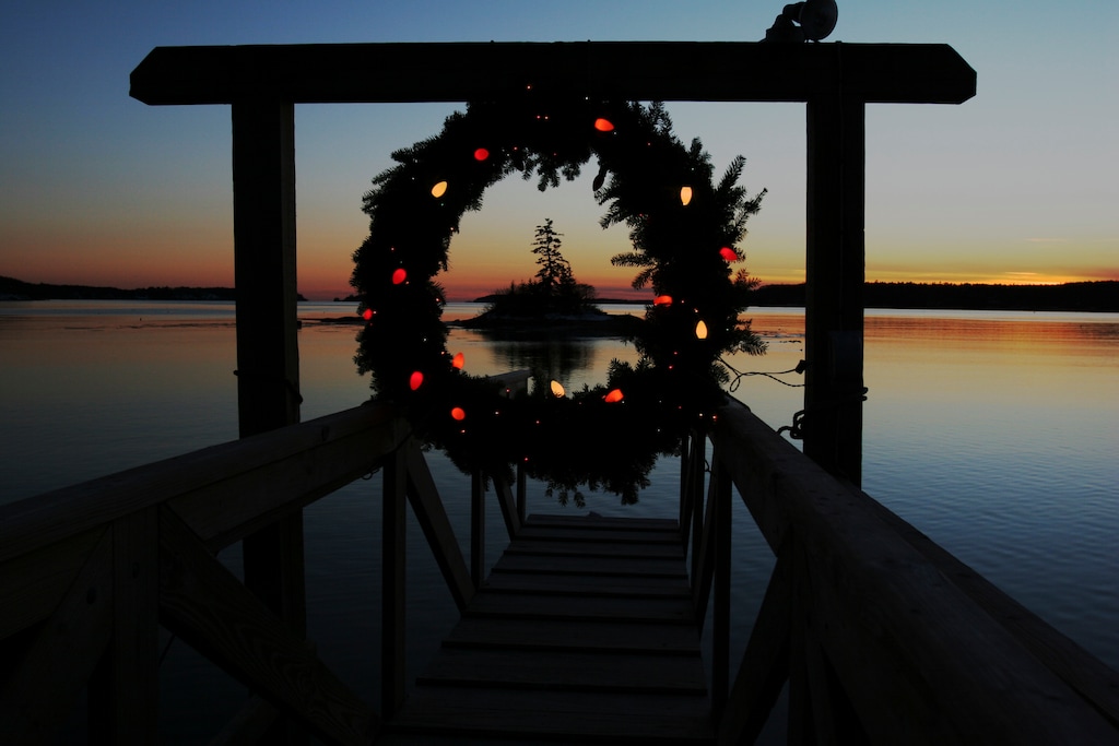 (Pat Wellenbach | AP photo)

This Tuesday, Dec. 18, 2007, photo shows a Christmas wreath decorated with lights at the end of a dock at sunset on Linekin Bay in East Boothbay, Maine. Wintertime can trigger true but transient depression in some people, a condition sometimes called Seasonal Affective Disorder. It's linked with lack of sunlight in winter and some scientists think affected people overproduce the sleep-regulating hormone melatonin. Research suggests it affects about 6 percent of the U.S. population and rates are higher in Scandinavia. But contrary to popular belief, suicides peak in springtime, not winter. No one has figured out why.