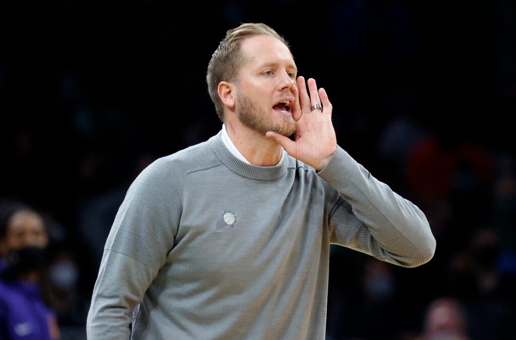 (Mary Schwalm | AP) Phoenix Suns acting head coach Kevin Young yells to his team during the first half of an NBA basketball game against the Boston Celtics, Friday, Dec. 31, 2021, in Boston.
