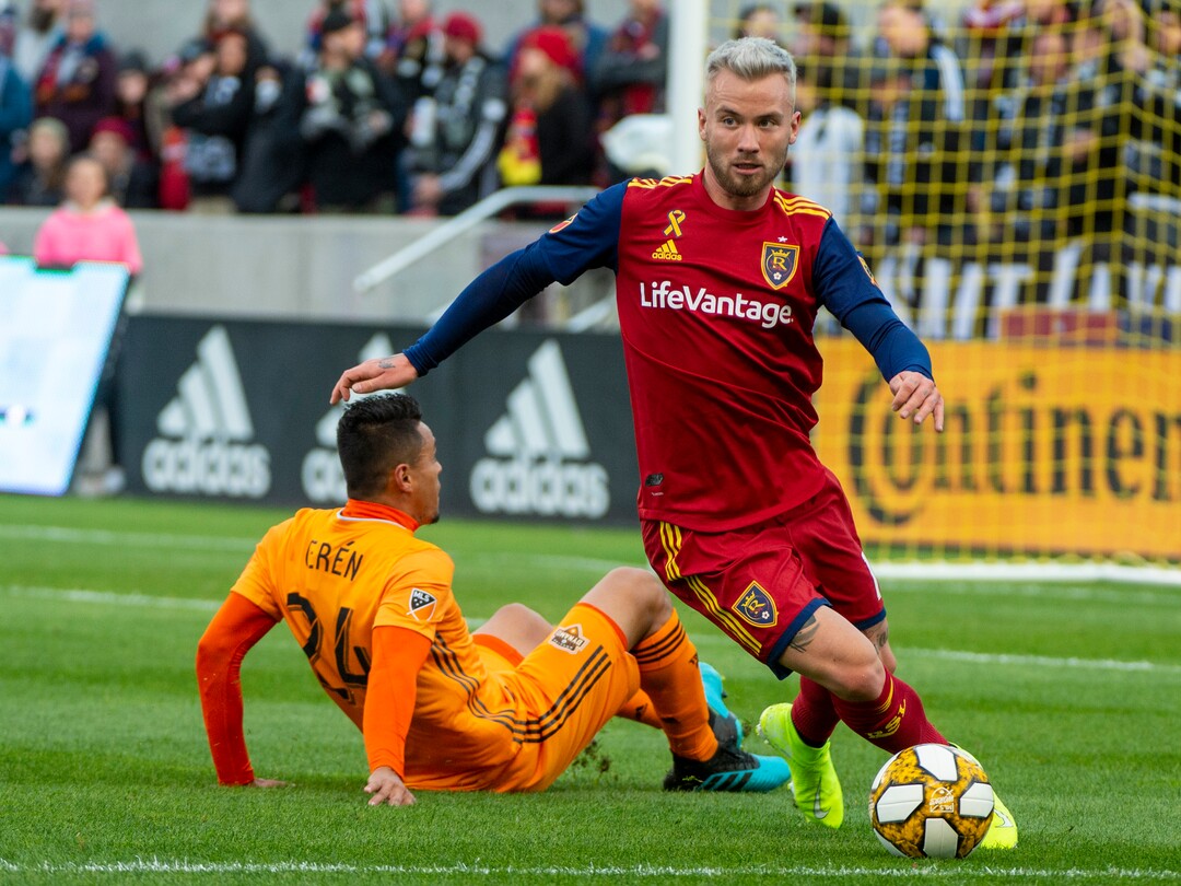 (Rick Egan  |  The Salt Lake Tribune)      Real Salt Lake midfielder Albert Rusnak (11) gets past Houston Dynamo midfielder Darwin Ceren (24),  in MLS action between Real Salt Lake and Houston Dynamo, at Rio Tinto Stadium, Sunday, Sept. 29, 2019.