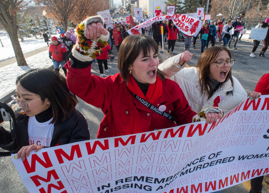 (Rick Egan | The Salt Lake Tribune) From left, Yen Hoang, Camryn Fife and Birdy Francis chant as they lead the marchers up State Street from Washington Square Park to the Capitol Building, in the 2020 Womxn's March in Salt Lake City, Saturday, Jan. 18, 2020.