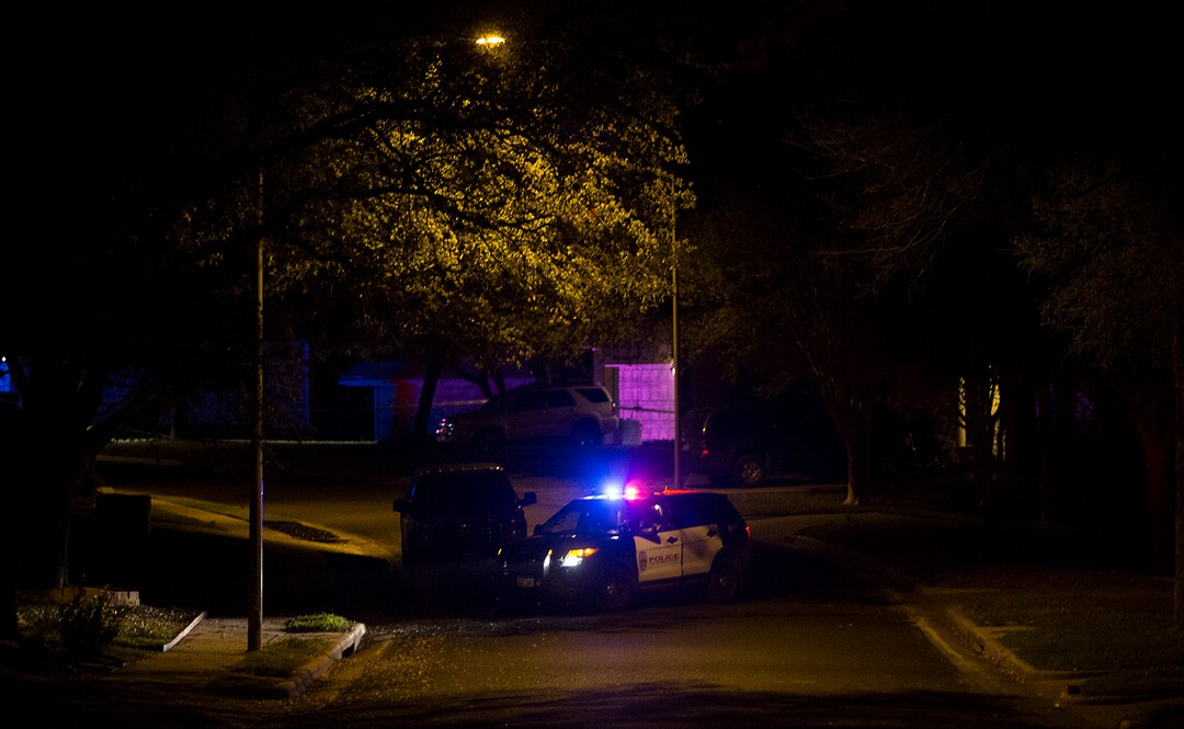 A police vehicle blocks a road leading to the scene of an explosion, Sunday, March 18, 2018, in Austin, Texas. (Nick Wagner/Austin American-Statesman via AP)