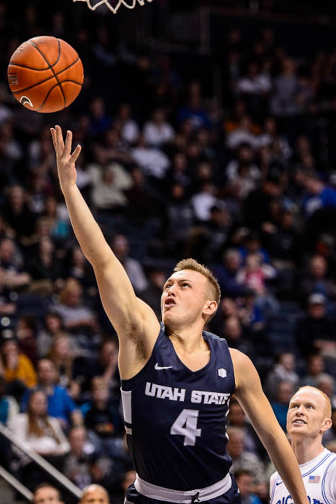 (Trent Nelson | The Salt Lake Tribune)  Utah State Aggies guard Crew Ainge (4) as BYU hosts Utah State, NCAA basketball in Provo on Wednesday Dec. 5, 2018.