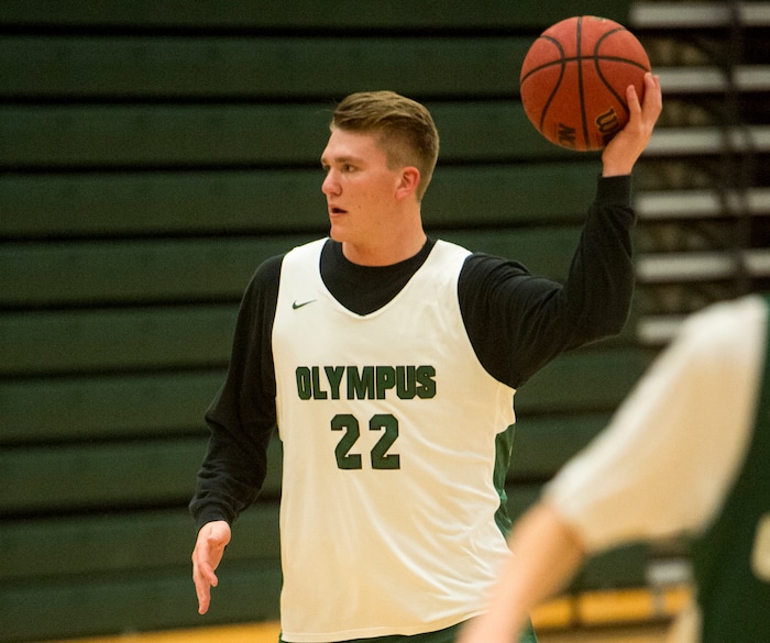 (Rick Egan  |  The Salt Lake Tribune)    Spencer Jones (22), one of Olympus boys' basketball team's two big men, runs drills during basketball practice, Monday, January 8, 2018.