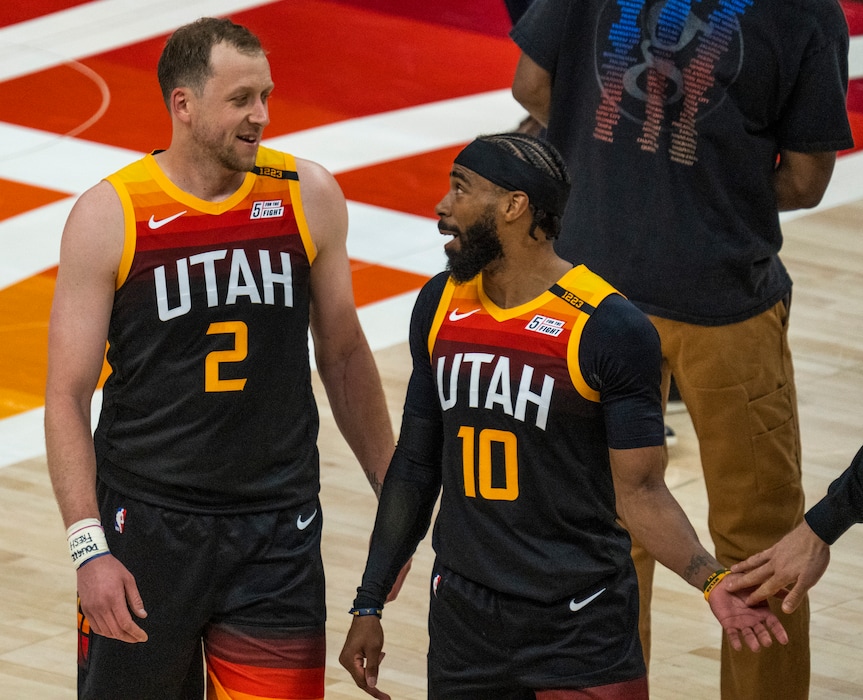 (Rick Egan | The Salt Lake Tribune) Utah Jazz guard Joe Ingles (2) shares a laugh with Utah Jazz guard Mike Conley (10), during a break in the action, in game 2 of NBA Playoffs at Vivint Arena, on Wednesday, May 26, 2021.