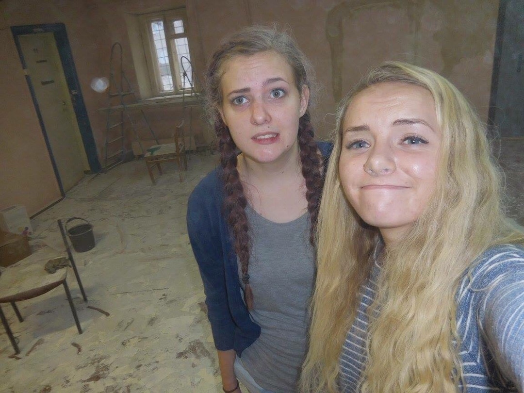 |  Courtesy Sariah WarnickSariah Warnick with her companion during a service project, helping spackle and paint, at a center for the blind in Saratov.