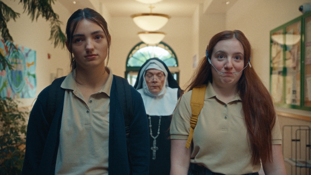 (Brenna Empey  |  Infigo Films) Edie Arnold (Adi Madden Cabrero, left) and her best friend Frances (McKenna Tuckett) are late to class at their all-girl Catholic school, and caught by Sister Myra (Star Hermann), in the Utah-made teen comedy "Edie Arnold Is a Loser," directed by Megan Rico and Kade Atwood.
